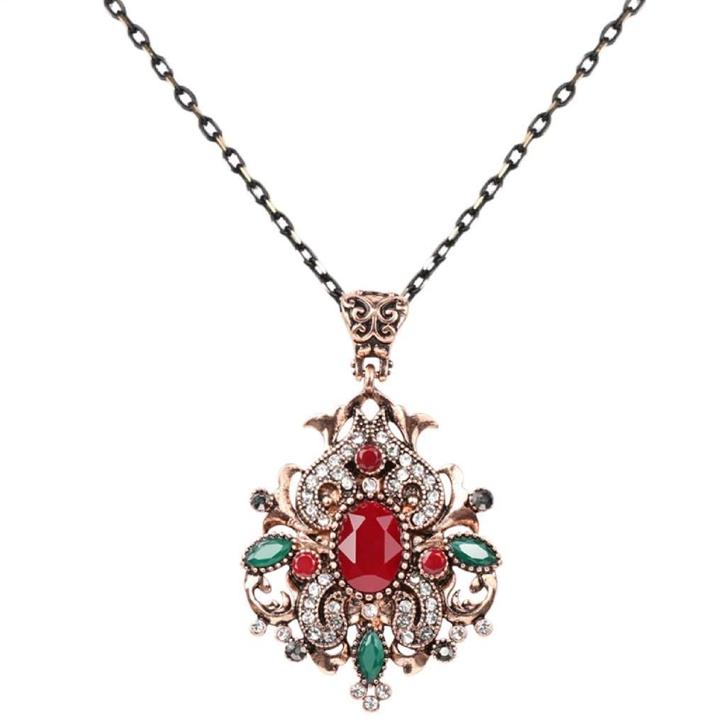 Buy the Red Stone Ornate Gold Pendant Necklace | JaeBee