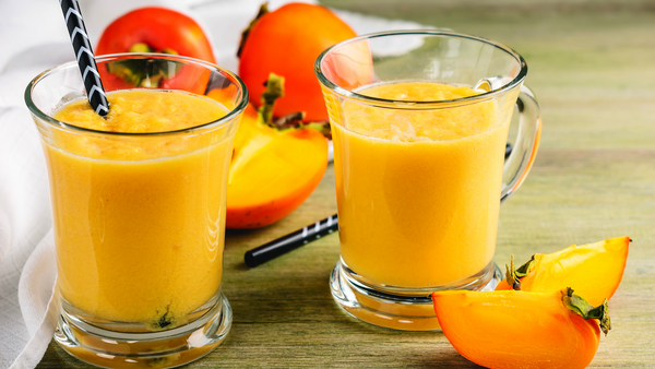 Two glasses of persimmon smoothie