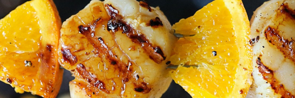 grilled scallop and orange kebab
