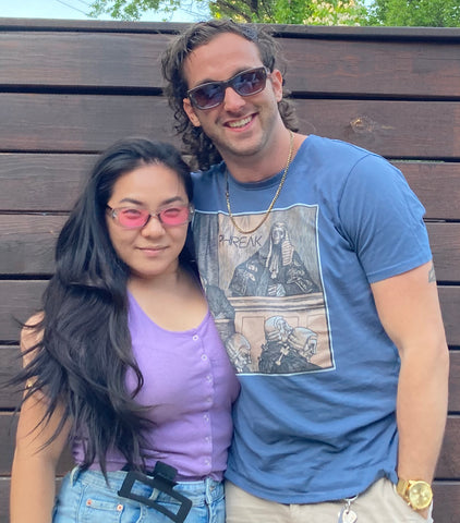 happy couple wearing sunglasses