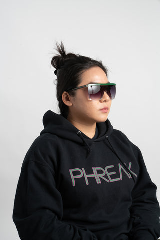 woman wearing black hoodie and shield sunglasses