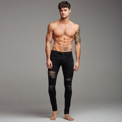 stretch black ripped jeans