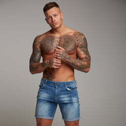 guy in denim shorts