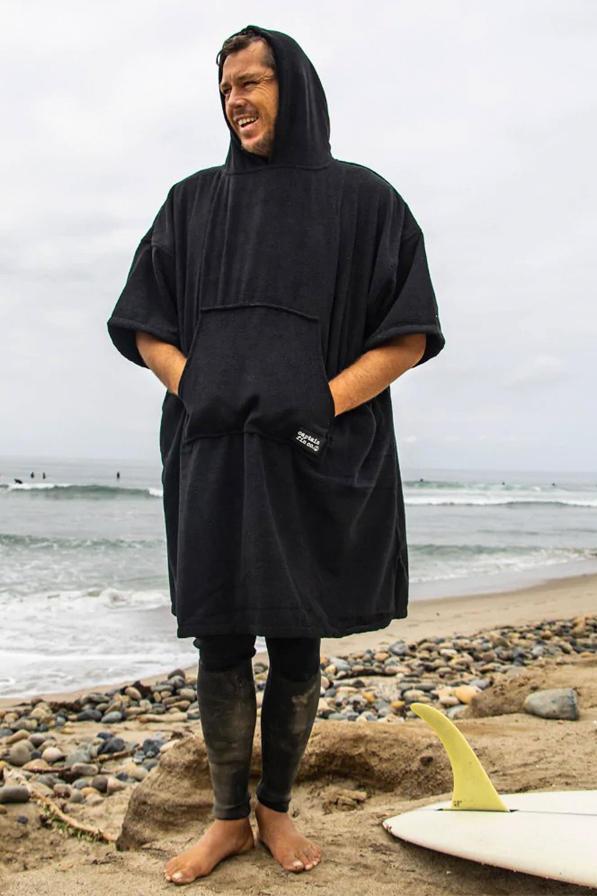 Pukas-Surf-Shop-captain-fin-poncho-changing-robe-black-man