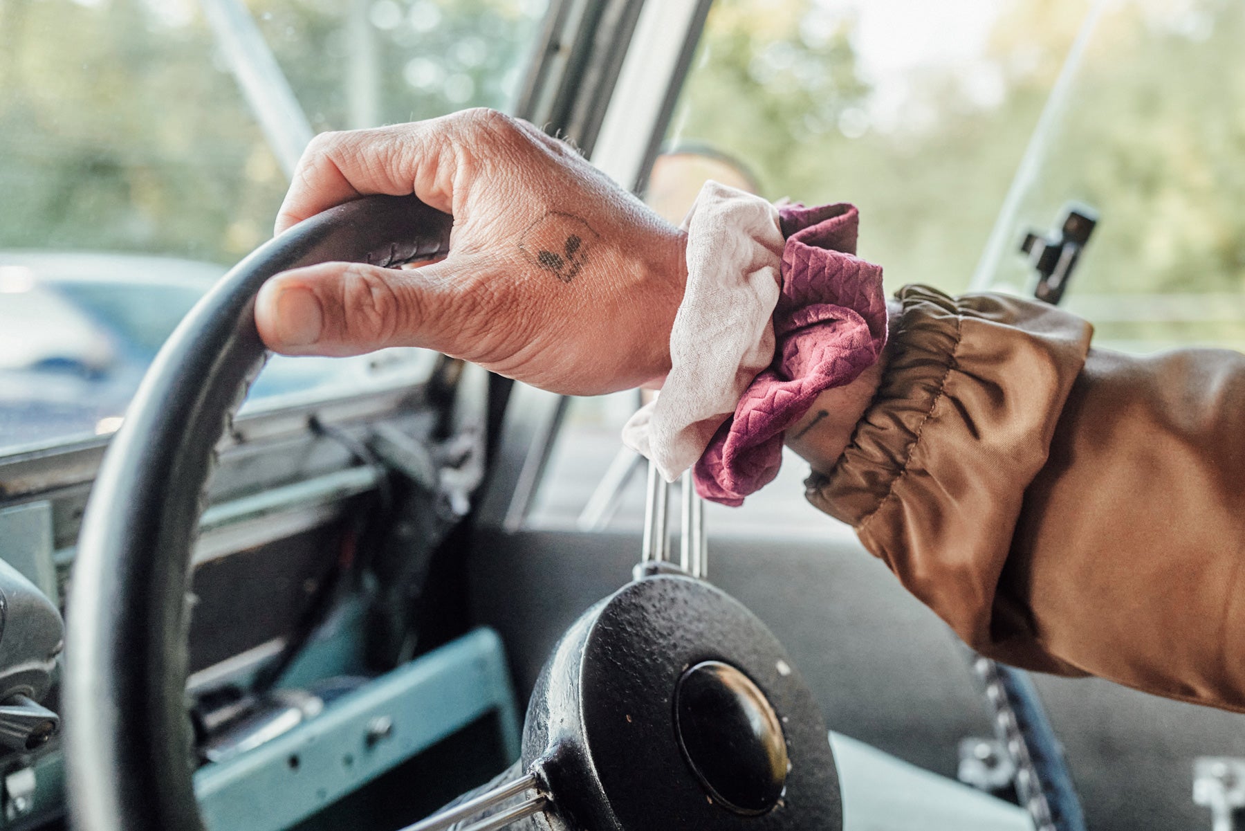 so ill x on the roam scrunchie being worn by jason momoa in a vintage car