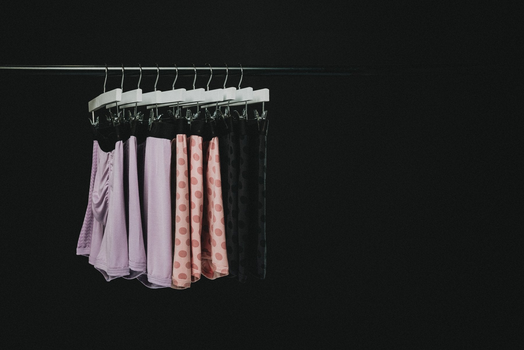 so ill x BN3TH x on the roam boxer briefs dirty pink and black triangles hanging from a hanger