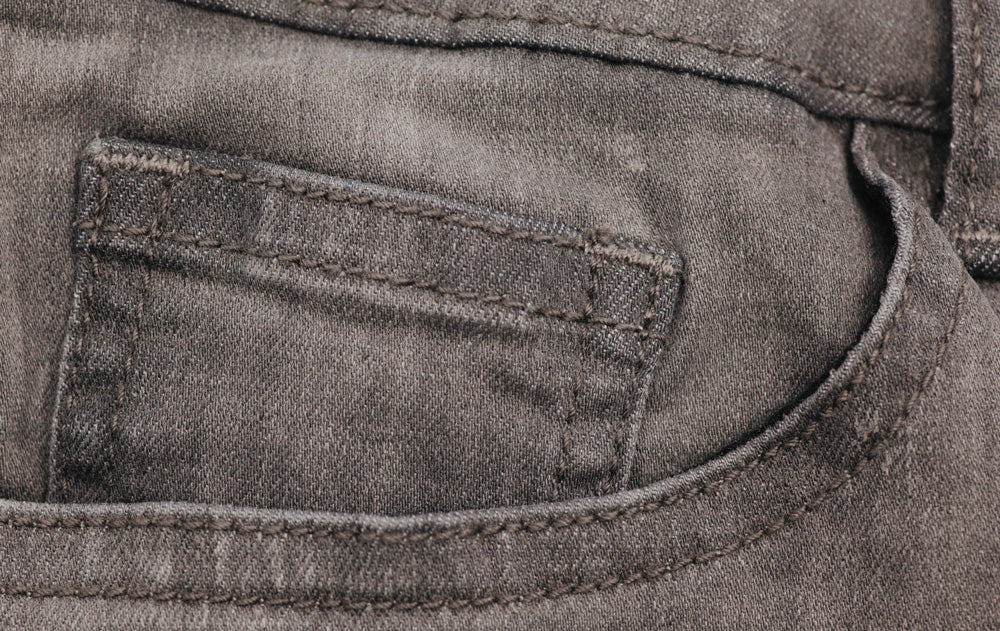 metalwork detail of So iLL Grey Denim Climbing Jeans