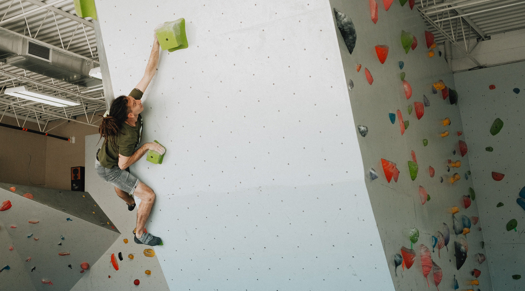 So iLL founder Dave Chancellor climbs on So iLL climbing holds The Wrecktangles in the So iLL New Zero Climbing Shoe