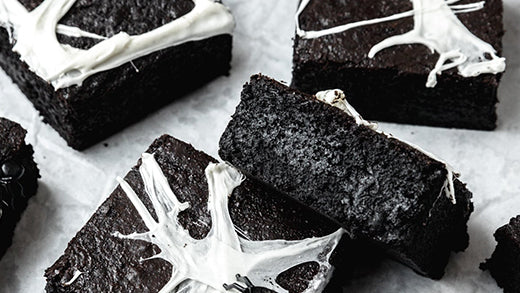 These black cocoa brownies are made with black cocoa powder and decorated with super easy marshmallow spiderwebs for a fun, spooky Halloween treat that both kids and adults will love!