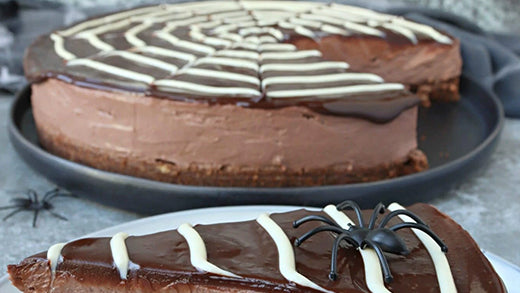 This Chocolate Spiderweb Cheesecake is not only a fantastically creepy Halloween treat, but it's also the ultimate chocolate cheesecake indulgence!