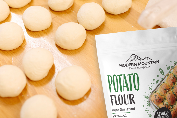 A pouch of Modern Mountain Potato Flour next to dough balls