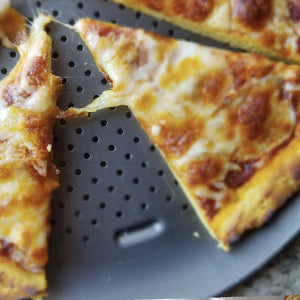 Slices of low-carb pizza crust made with oat fiber and lupin flour