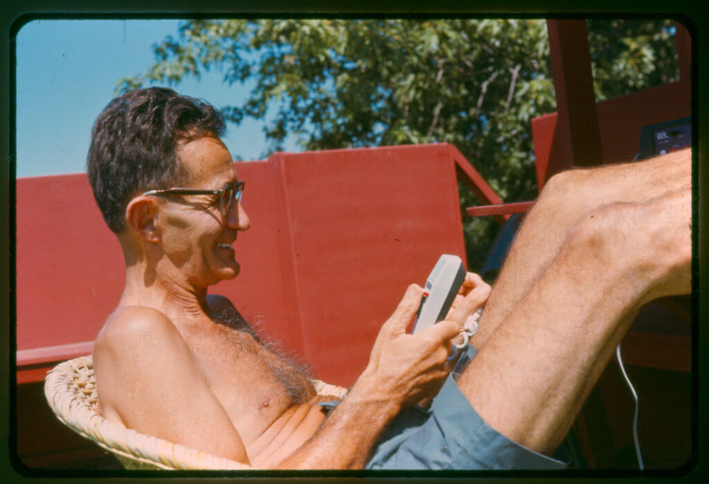 Dr. Bronner outside relaxing in the sun.