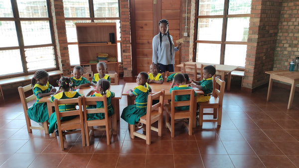 A teacher and her students at the newly created preschool in Ghana.