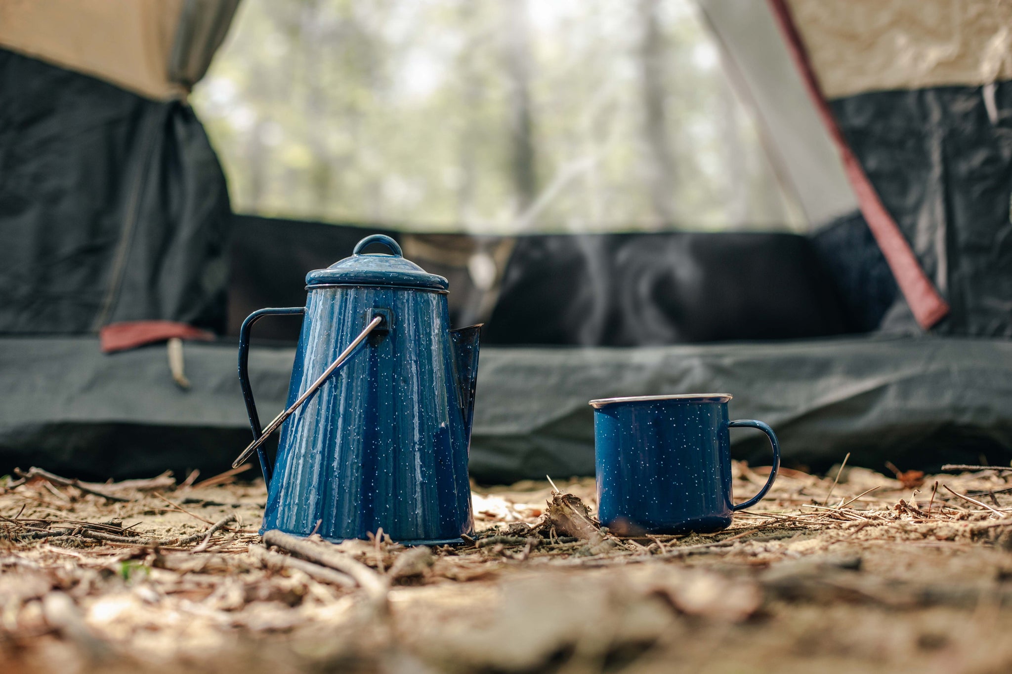 camping with a steaming hot cup of clear lake coffee roasters colombia blend
