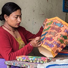 Woman artisan painting