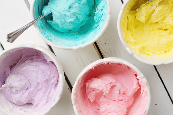 Colored frosting in cups