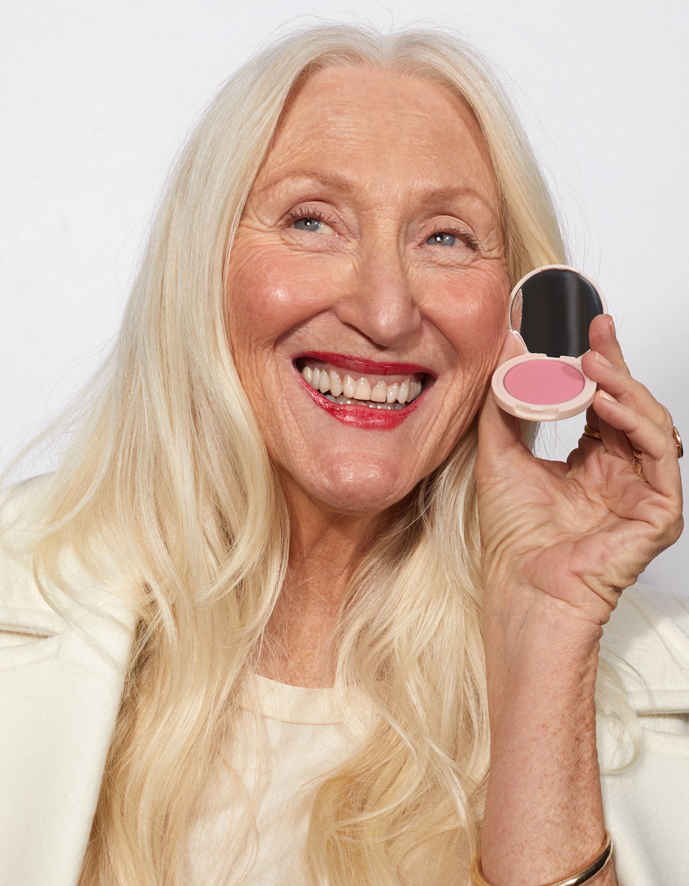 A woman holding The Best Blush by Jones Road
