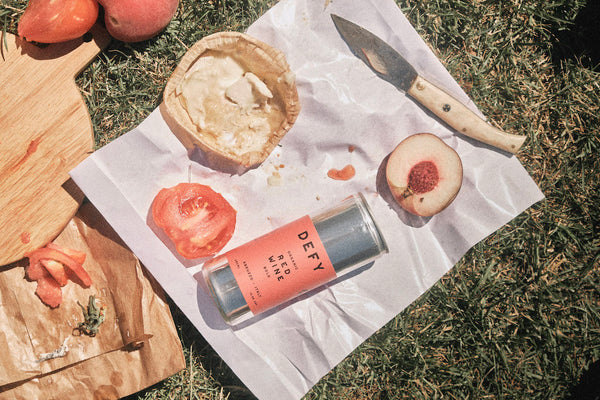 DEFY canned vegan organic red wine at a picnic - no glass needed