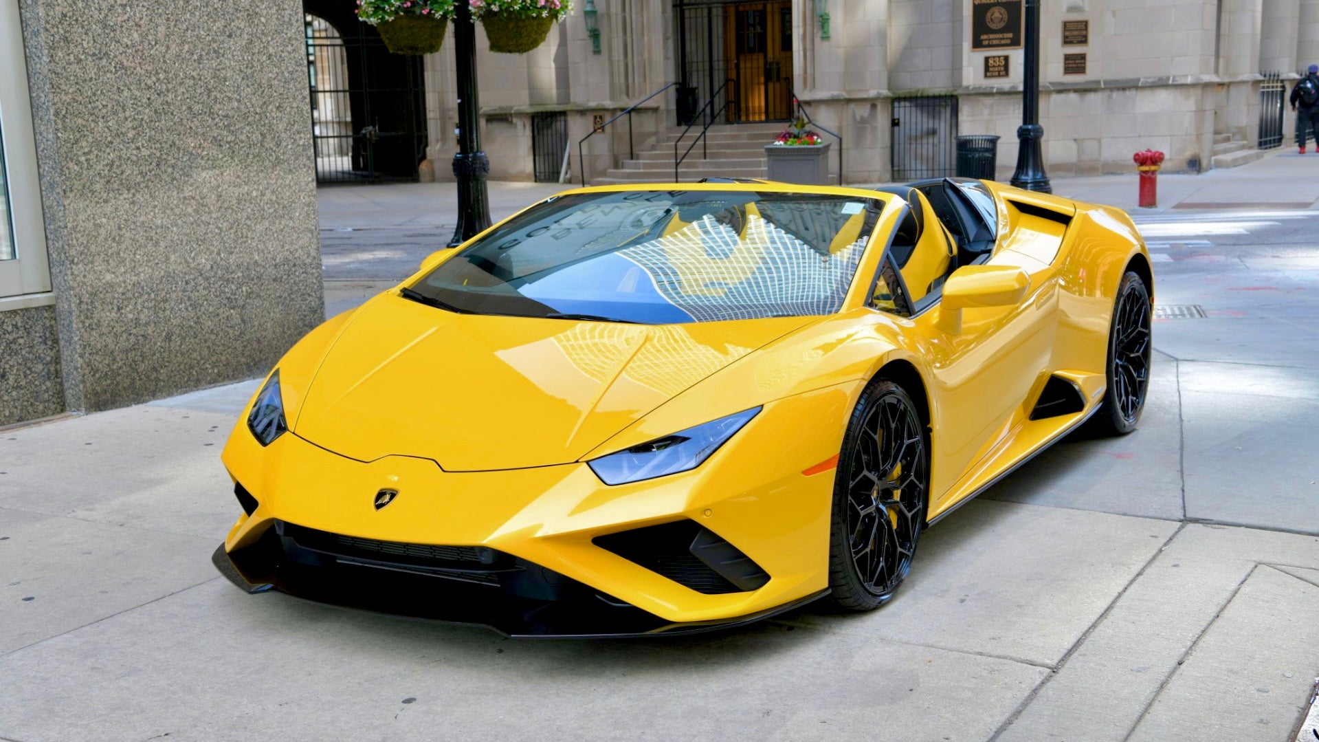 Rent a Lamborghini Huracán EVO Spyder (yellow) – ROSENBERG Collection