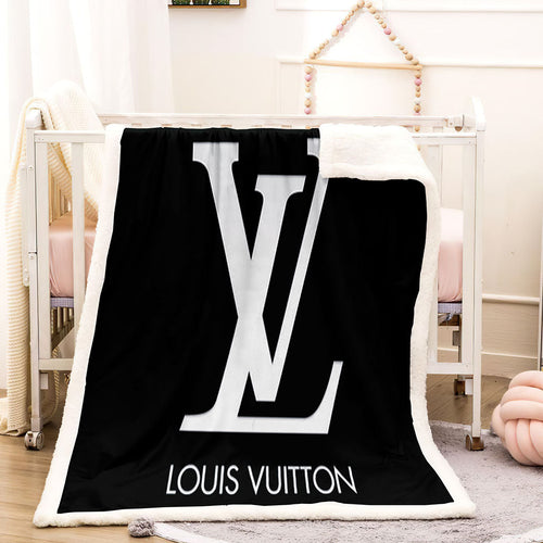 white and purple louis Vuitton blanket