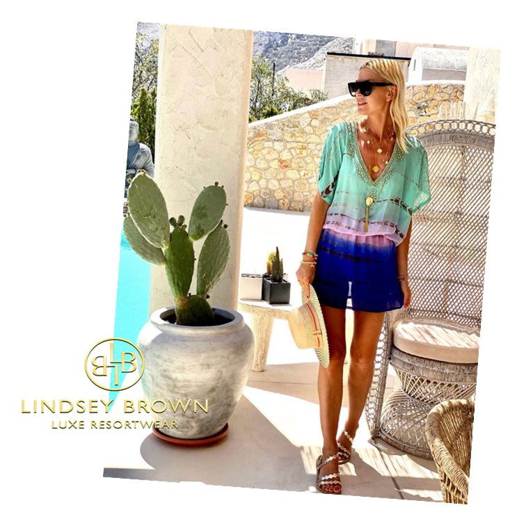 Anna Mavrisis in Santorini wears Aqua Designer Kaftan by LindseyBrown resort wear