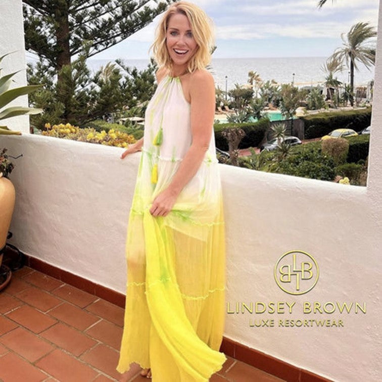 Laura Hamilton wears yellow maxi dress on a place in the sun