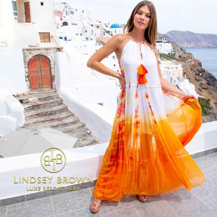 Orange silk designer holiday dresses by Lindsey Brown resort wear