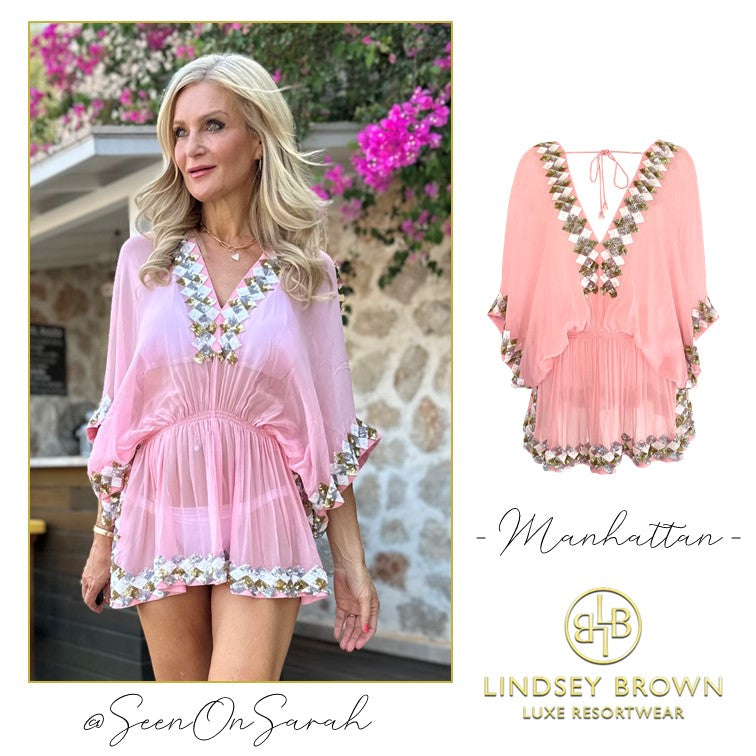 Pink Silk short designer kaftan to wear on holiday by Lindsey Brown luxury resort wear is a beautiful shade of pink with gold silver and white sequins. We spotted the super stylish @SeenOnSarah wearing hers on holiday in Rhodes this summer.