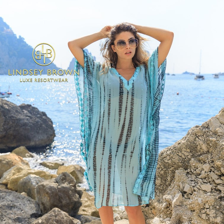 Aqua blue silk designer kaftans to wear on holiday by Lindsey Brown resort wear 