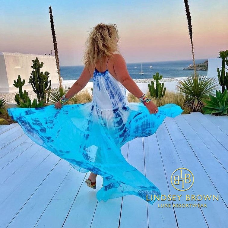 JewelChic wearing Turquoise silk maxi dress on holiday in Greece by Lindsey Brown