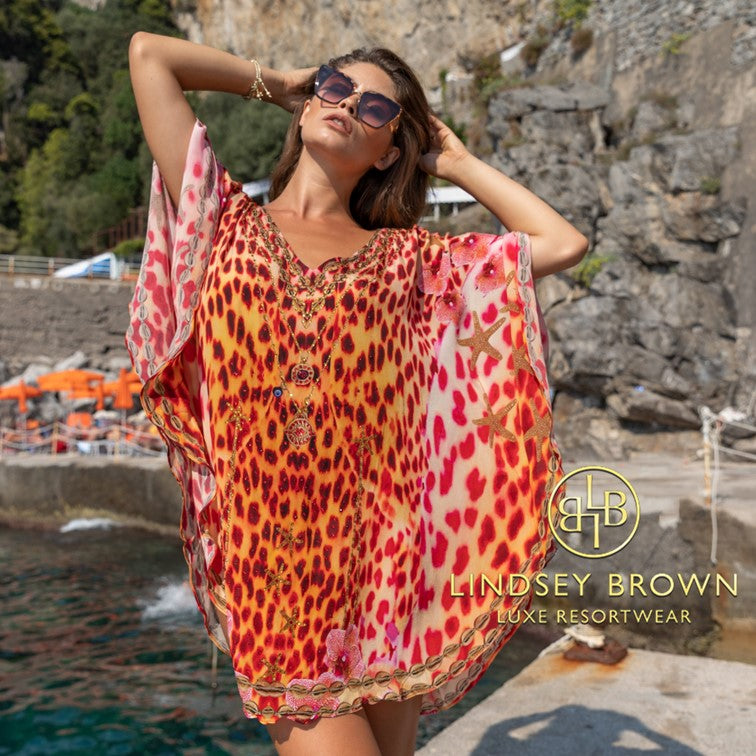Silk animal print designer kaftans to wear on a Cruise holiday 