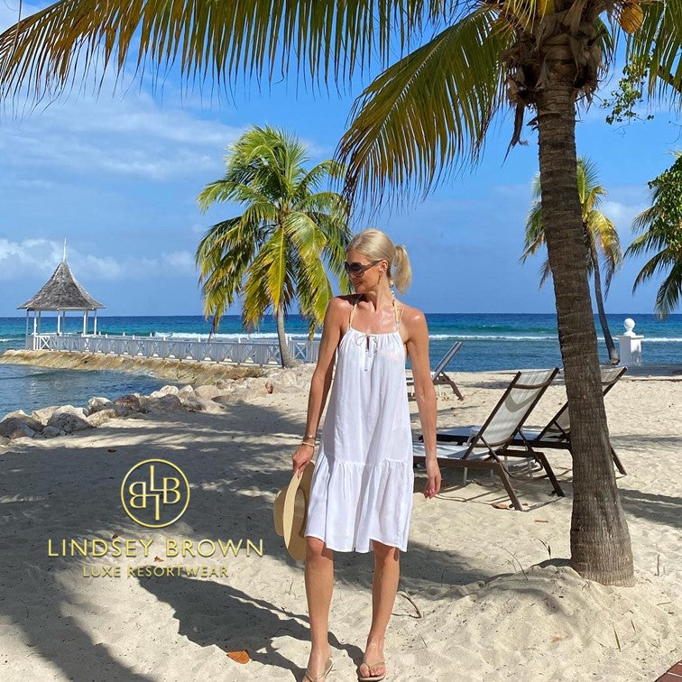 beautiful White beach dresses to wear on holiday by Lindsey Brown luxury resort wear