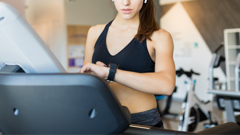 Woman watching her sports performance in real time