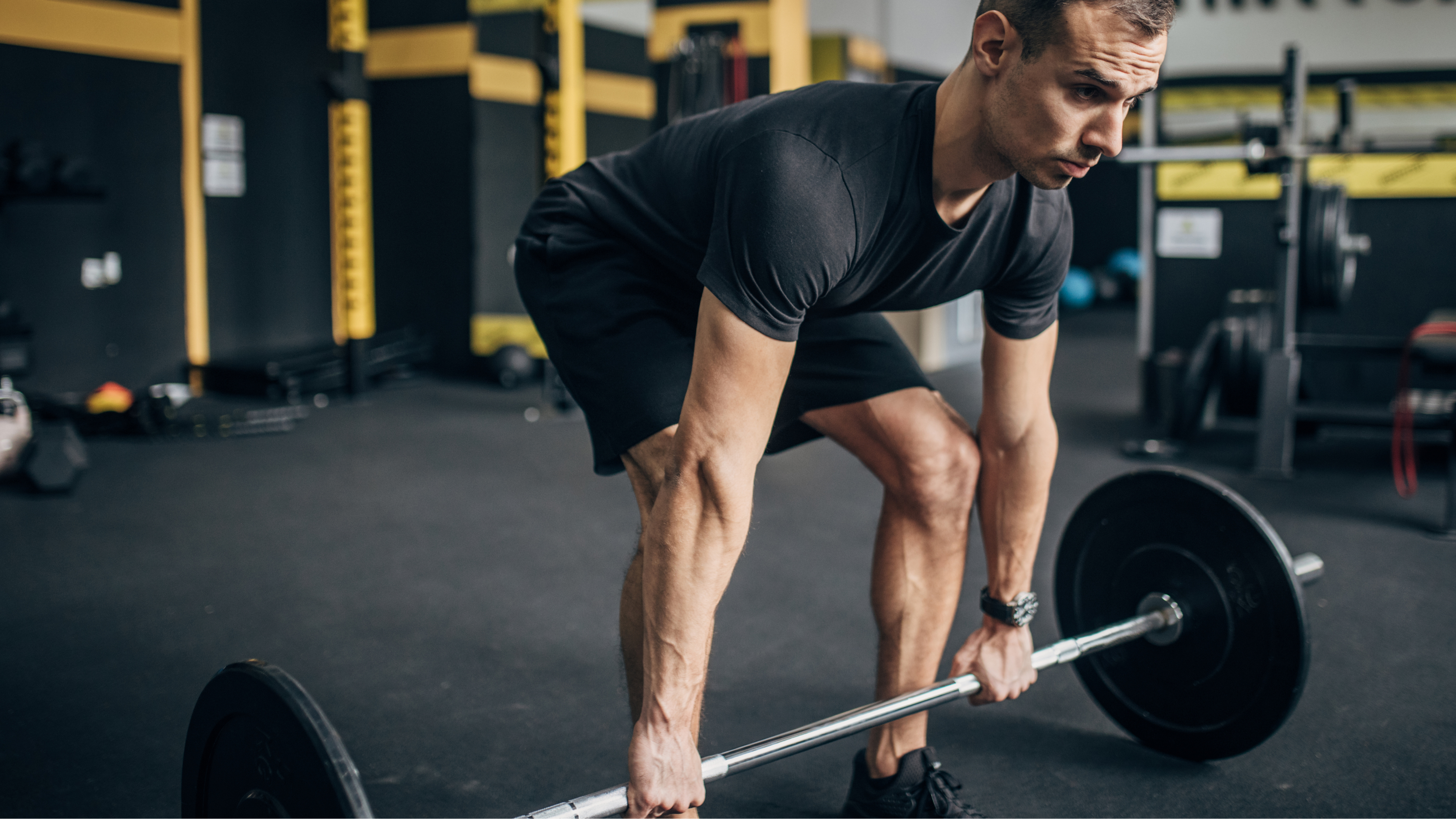 Man performing conventional deadlift