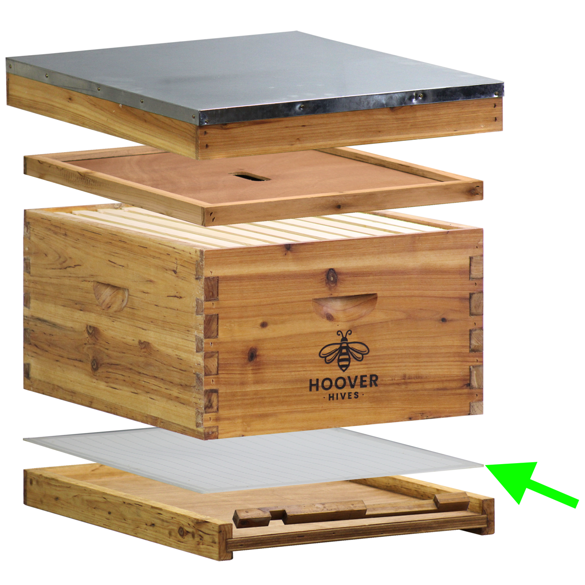 An Exploded View Of A Beehive Showing The Pieces Separated Apart. The Queen Excluder Is Placed Above The Solid Bottom Board