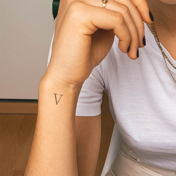 Delta Symbol Upper arrow means progress moving forward open delta  means opennes to change Tattoo  Small tattoos Small tattoo designs  Small symbol tattoos