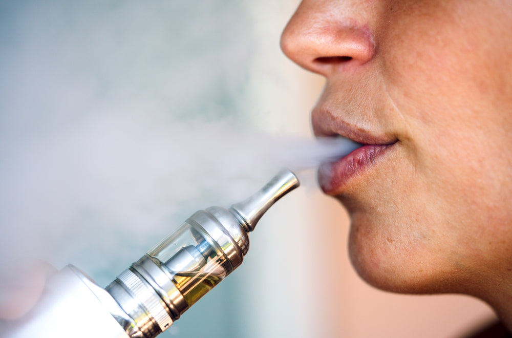 Close up of a person vaping