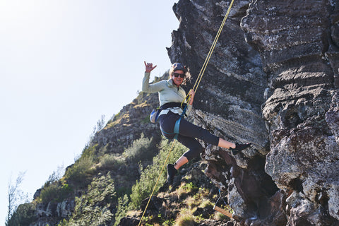 women rock climbing