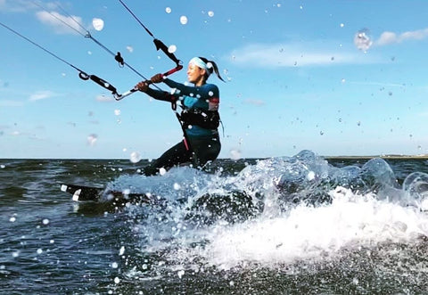 Woman kiteboarding outer banks