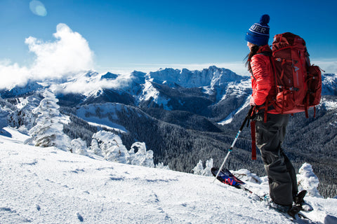 Woman backcountry skiing