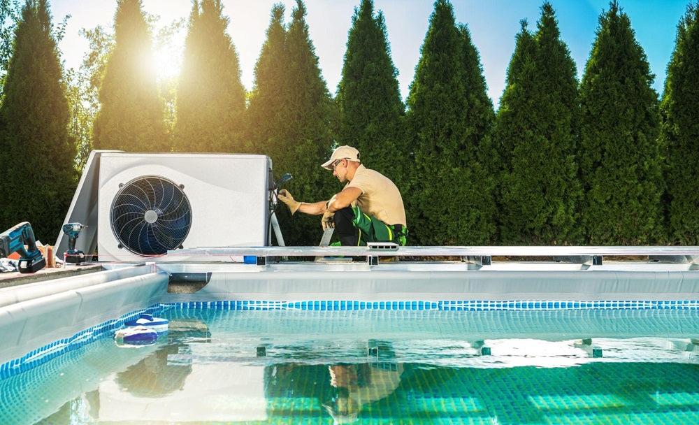 HVAC technician installing a swimming pool heater