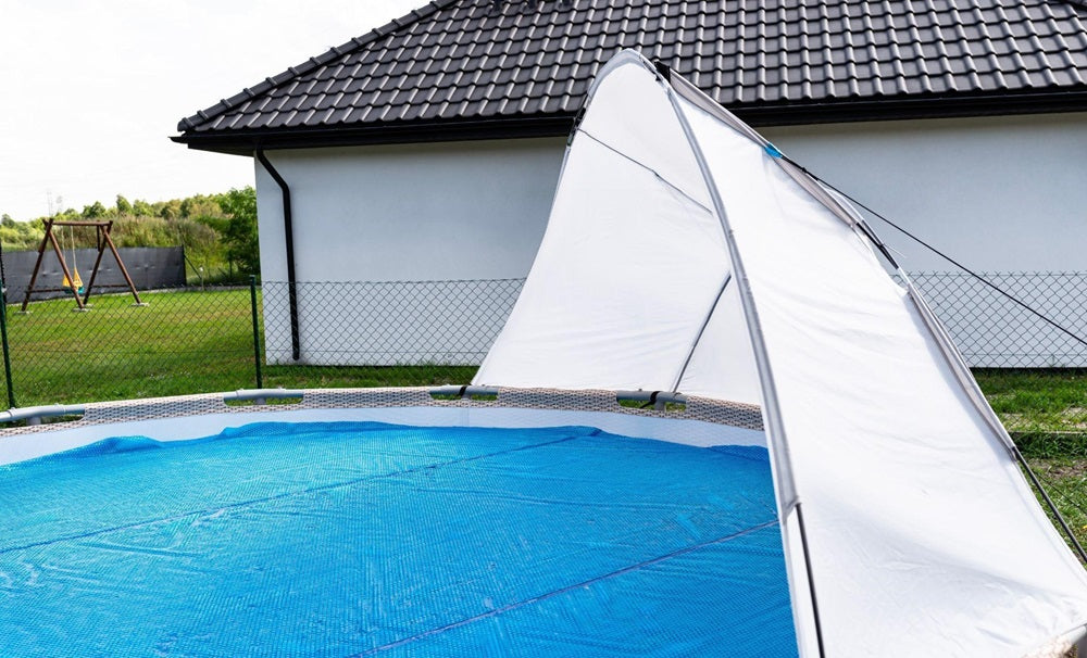 Large pool covered with a solar blanket