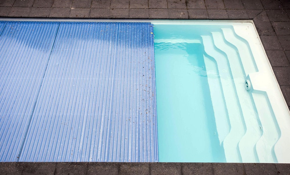 Swimming pool with shutter cover