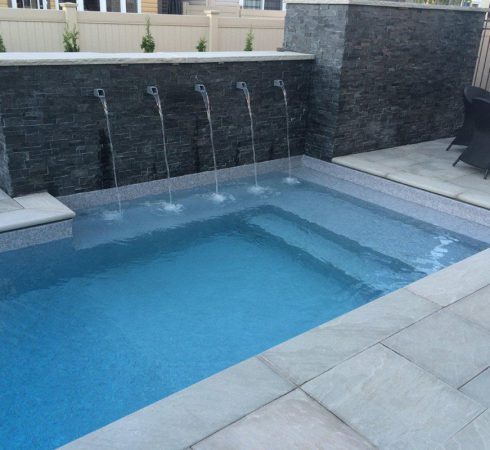 Swimming Pool Vinyl over steel bench VOS and steps in custom vinyl pool. Pool Products Canada is the top swimming pool builder contractor in Colingwood Ontario.
