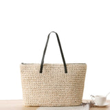 Straw Shoulder Bag shown with white background, next to a cup of tea.
