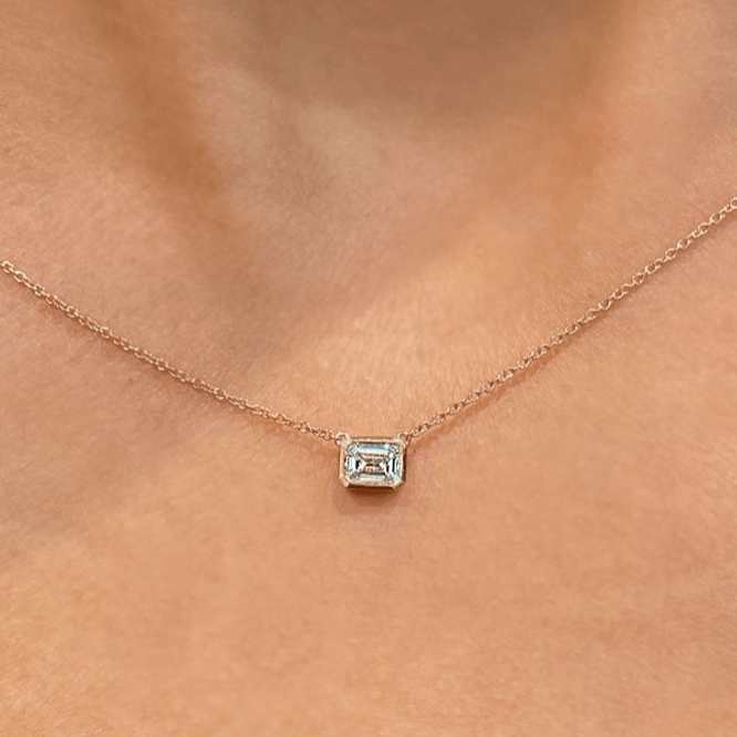 bezel set emerald cut necklace