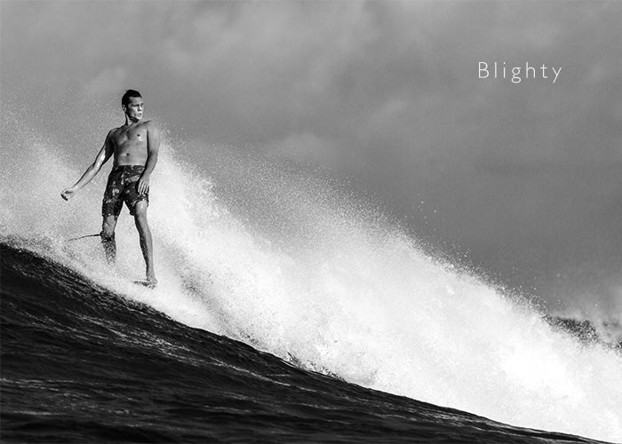 Sam Bleakley longboard surfing in the Riz Blighty long board short