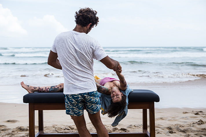 Holistic massage therapist Franco Rebagliati at work on the beach in Sri Lanka