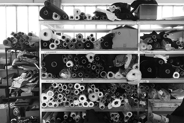 Rolls of fabric waiting to be turned into swim shorts and other clothing at the factory in Portugal where Riz swim shorts are made